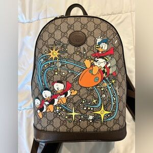 (SOLD)Authentic Gucci x Disney Donald Duck supreme monogram  small backpack